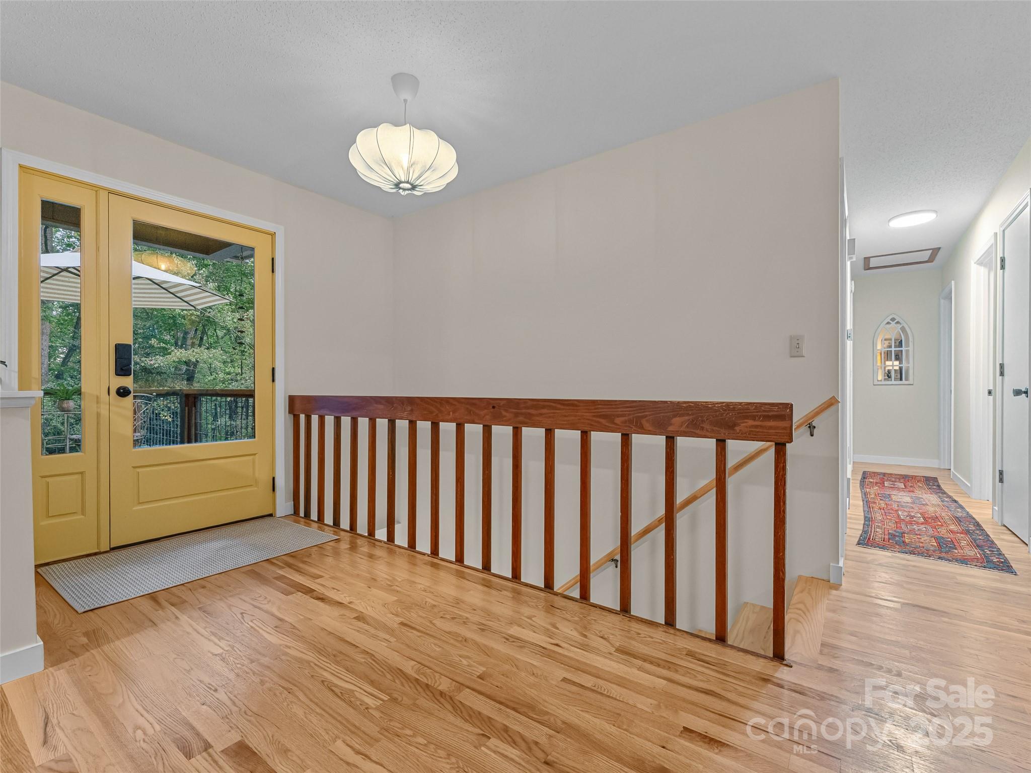 197 Tiptop Road Brevard, NC 28712 - Photo 4 of 45 a view of entryway with wooden floor