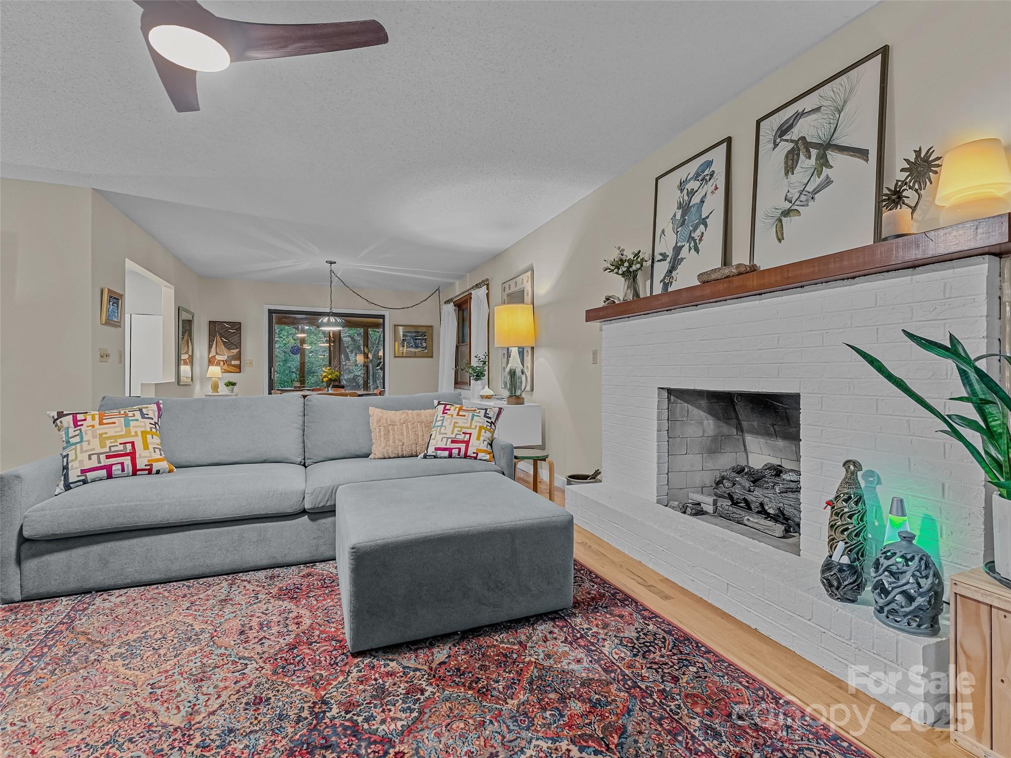 197 Tiptop Road Brevard, NC 28712 - Photo 8 of 45 a living room with furniture and a couch