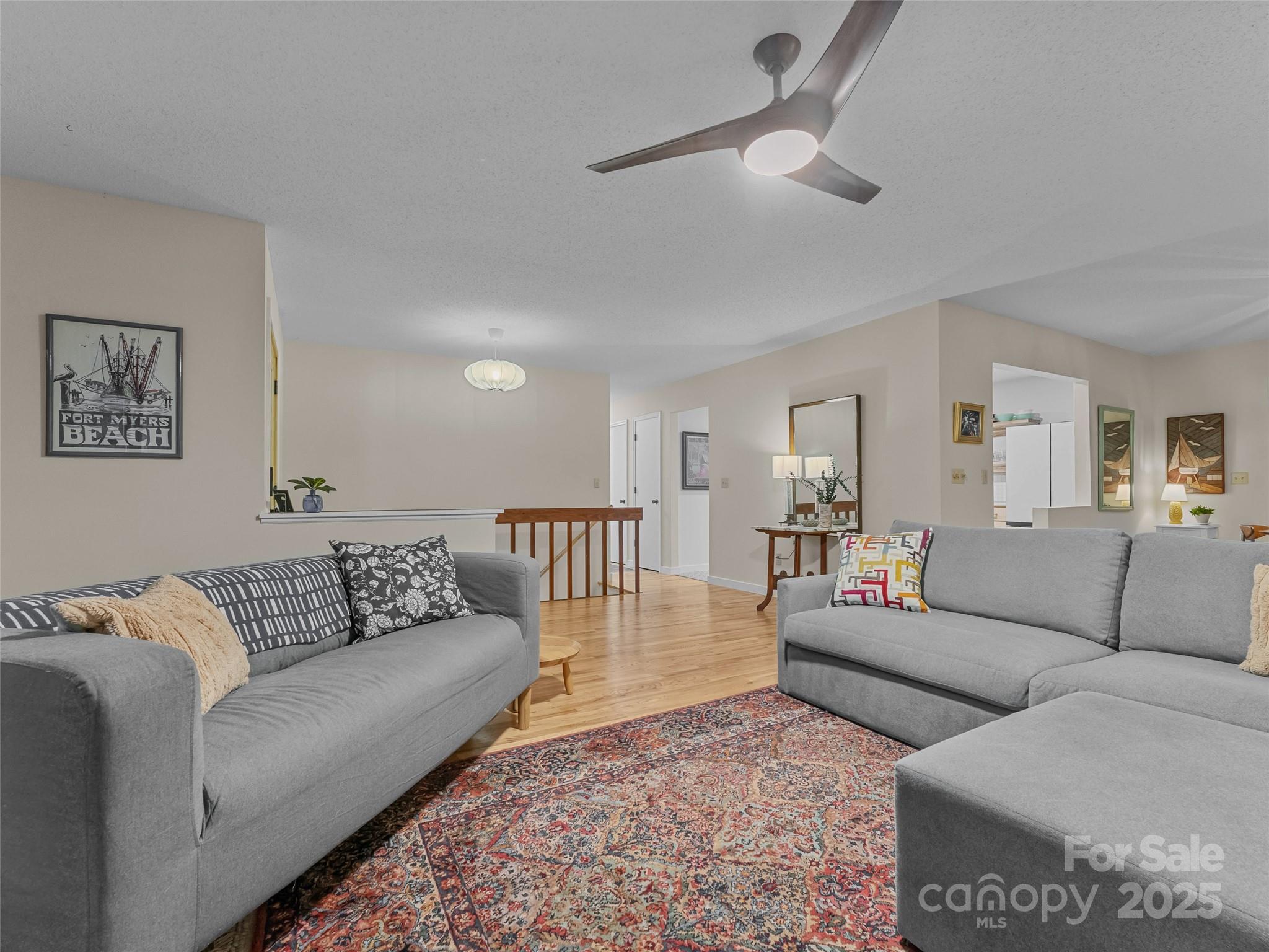 197 Tiptop Road Brevard, NC 28712 - Photo 9 of 45 a living room with furniture and a rug