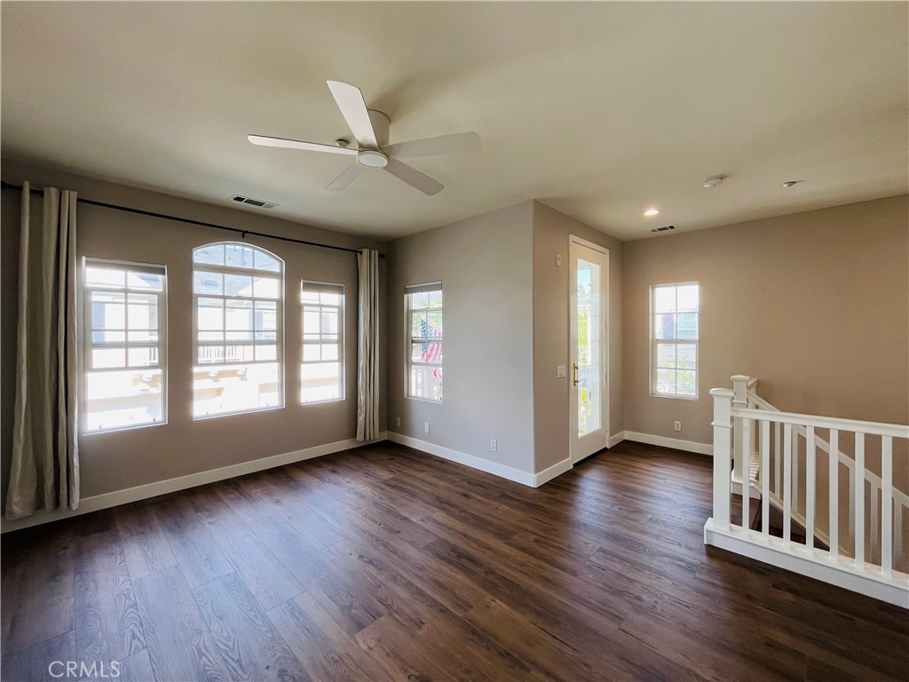 60 Strawflower Street Ladera Ranch, CA 92694 - Photo 22 of 22 a view of an empty room with wooden floor and a window