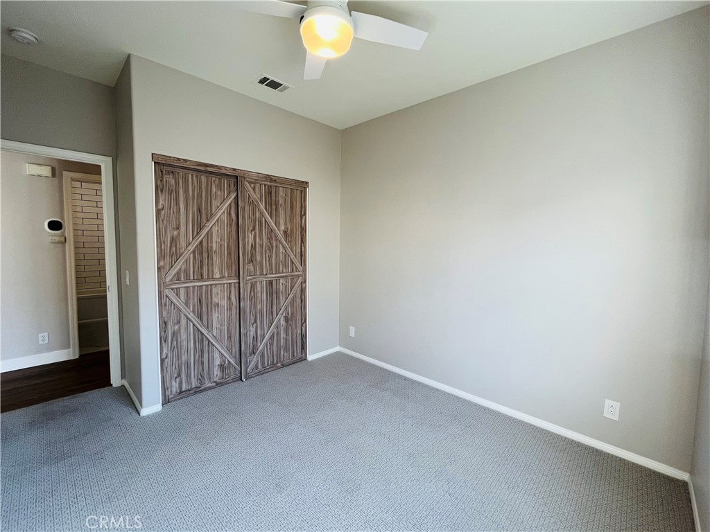 60 Strawflower Street Ladera Ranch, CA 92694 - Photo 16 of 22 an empty room with sliding door