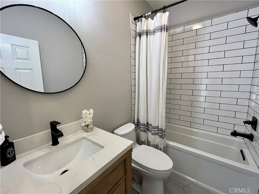 60 Strawflower Street Ladera Ranch, CA 92694 - Photo 17 of 22 a bathroom with a sink toilet and shower