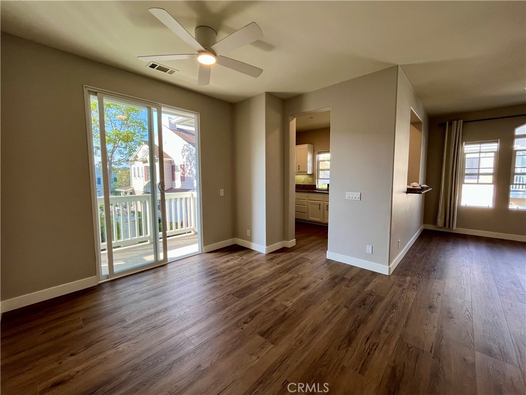 60 Strawflower Street Ladera Ranch, CA 92694 - Photo 10 of 22 a view of an empty room with window and wooden floor