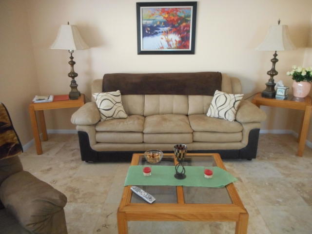 285 Norwich L West Palm Beach, FL 33417 - Photo 3 of 17 a living room with furniture and a couch