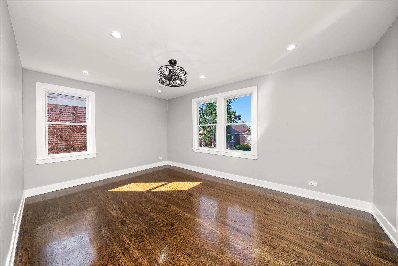 10047 South Calumet Avenue Chicago, IL 60628 - Photo 15 of 32 a view of an empty room and window