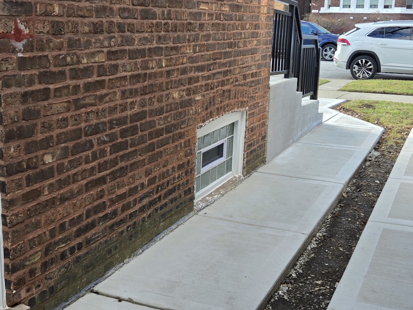 10047 South Calumet Avenue Chicago, IL 60628 - Photo 32 of 32 a bathroom with a sink and a mirror