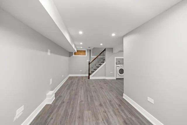 a view of entryway with wooden floor
