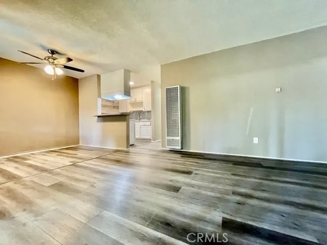 a view of a kitchen and a window