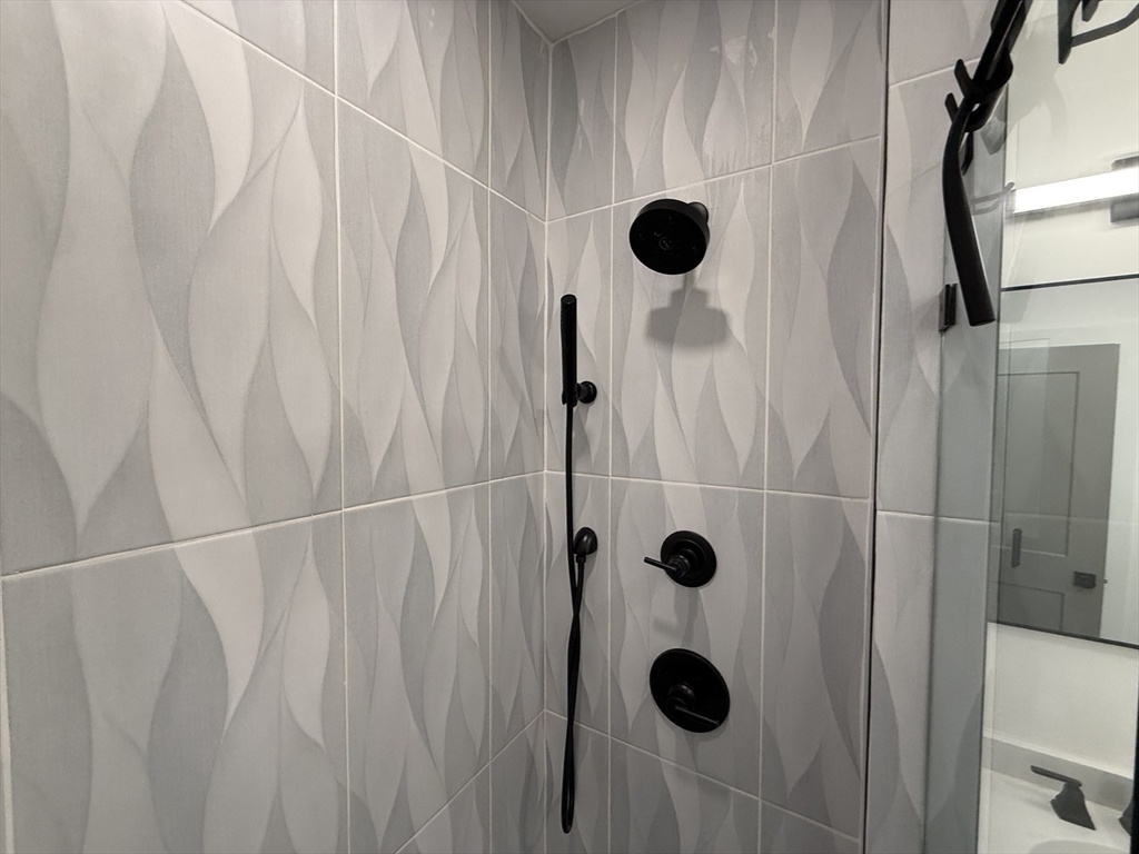52 Withington Street, Unit 7 Boston, MA 02124 - Photo 23 of 32 a view of shower tap