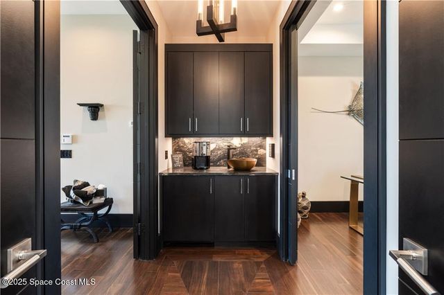 a workspace with furniture and a window