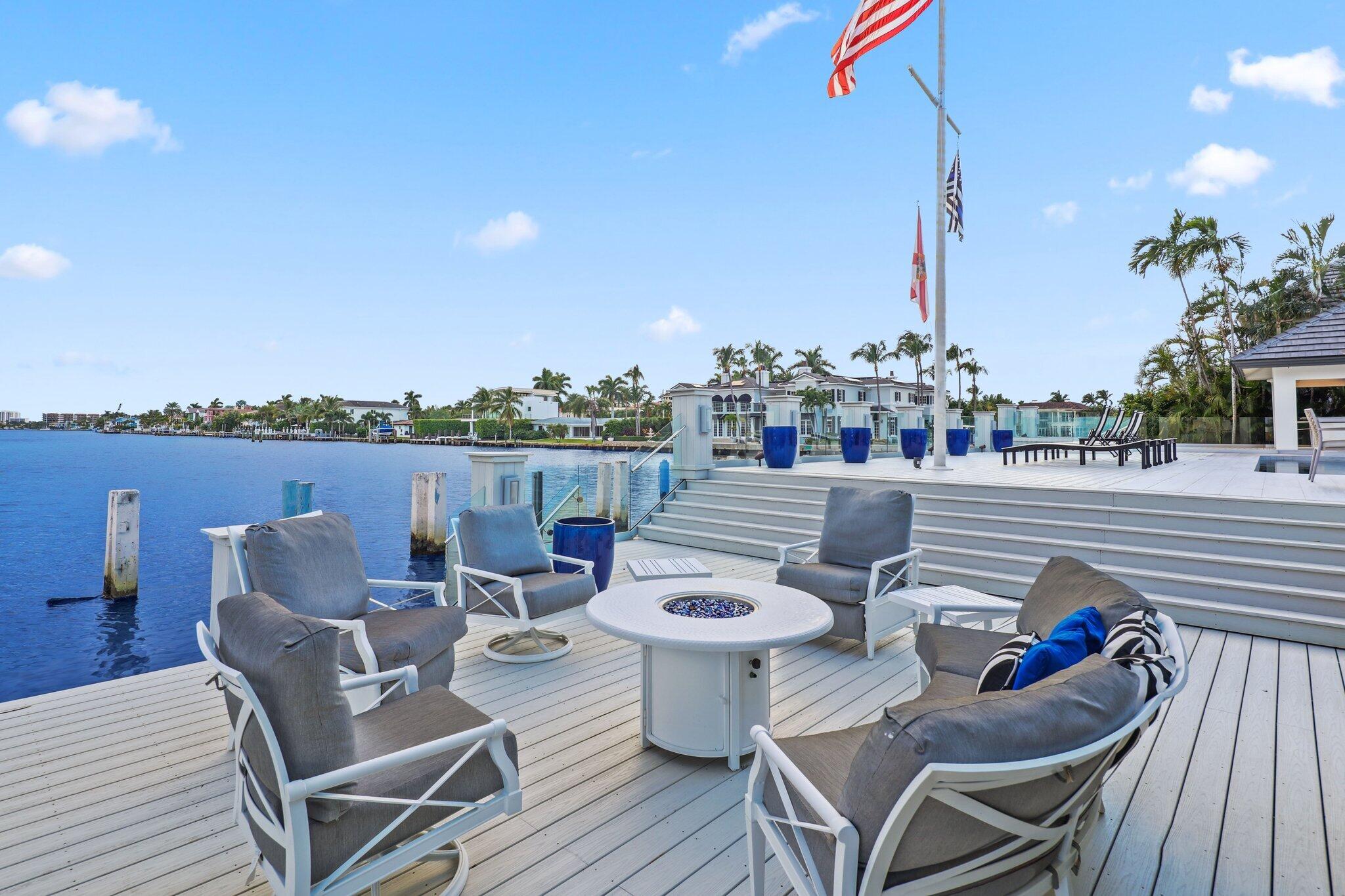 7400 Northeast Orchid Bay Drive Boca Raton, FL 33487 - Photo 22 of 63 a view of a roof deck with furniture