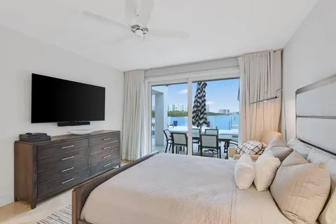 a view of swimming pool from a balcony