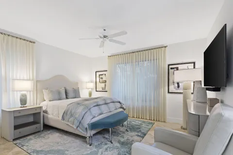 an aerial view of a house with a yard and garden