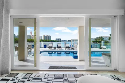 a view of roof deck with seating space and wooden floor