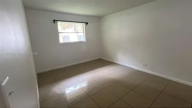 an empty room with a window