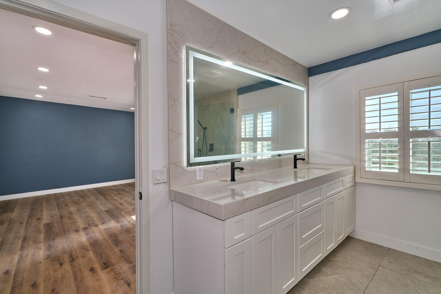 73300 Paradise Avenue Desert Hot Springs, CA 92241 - Photo 34 of 44 a bathroom with a sink and a mirror
