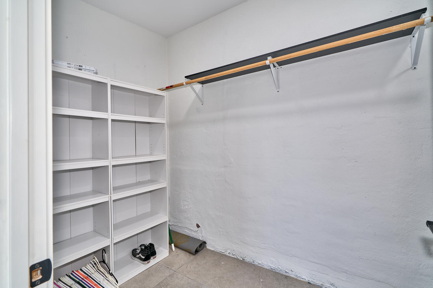 73300 Paradise Avenue Desert Hot Springs, CA 92241 - Photo 37 of 44 a view of a room with shelf on the wall