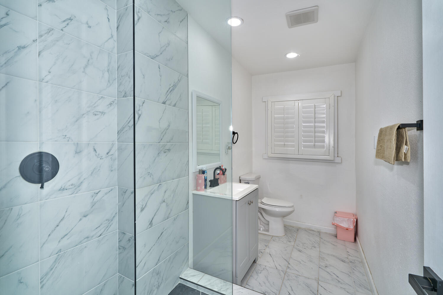 73300 Paradise Avenue Desert Hot Springs, CA 92241 - Photo 39 of 44 a bathroom with a sink toilet and shower