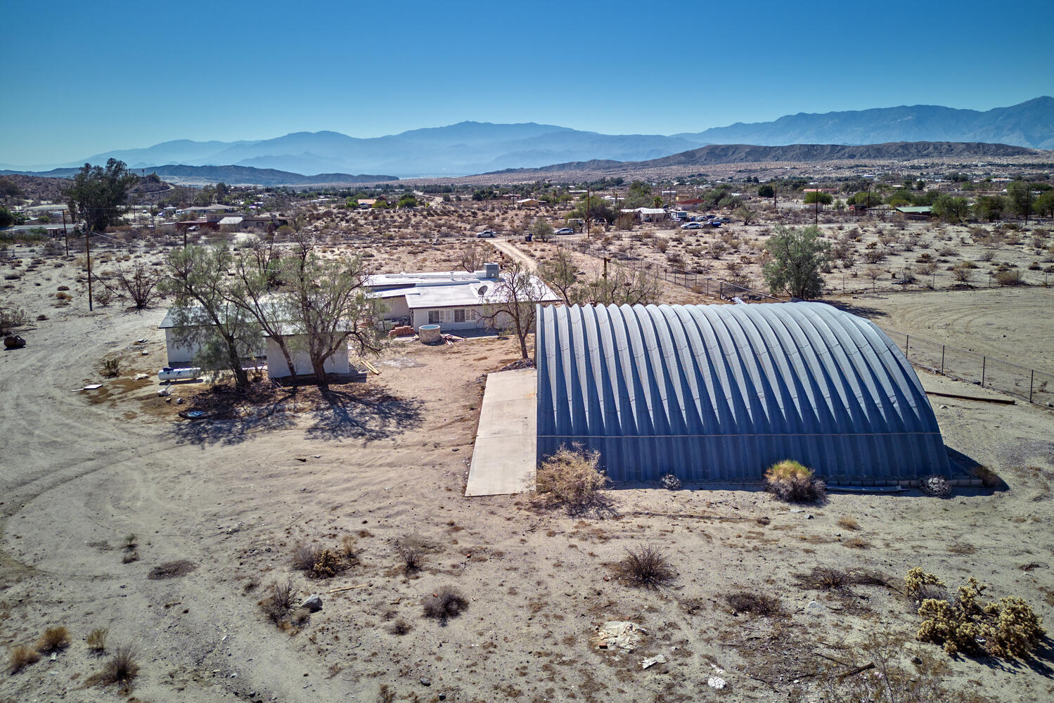 73300 Paradise Avenue Desert Hot Springs, CA 92241 - Photo 4 of 44 a view of a backyard of a house