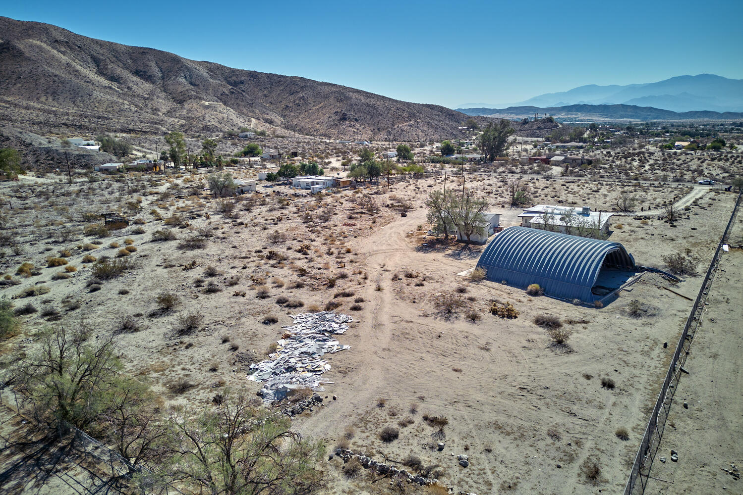 73300 Paradise Avenue Desert Hot Springs, CA 92241 - Photo 8 of 44 a view of roof with wooden floor