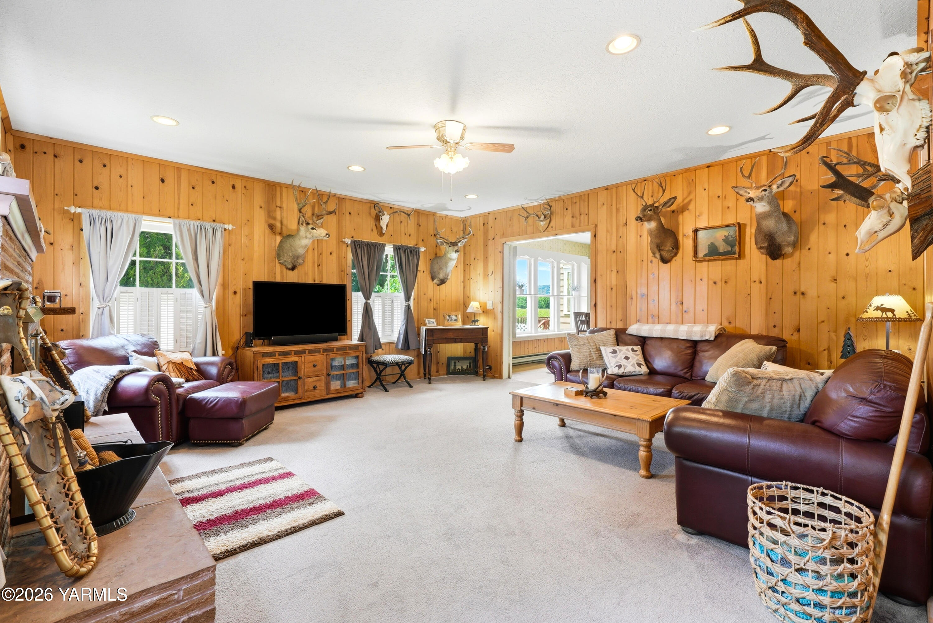 690 North Gleed Road Naches, WA 98937 - Photo 5 of 60 a living room with furniture and a flat screen tv