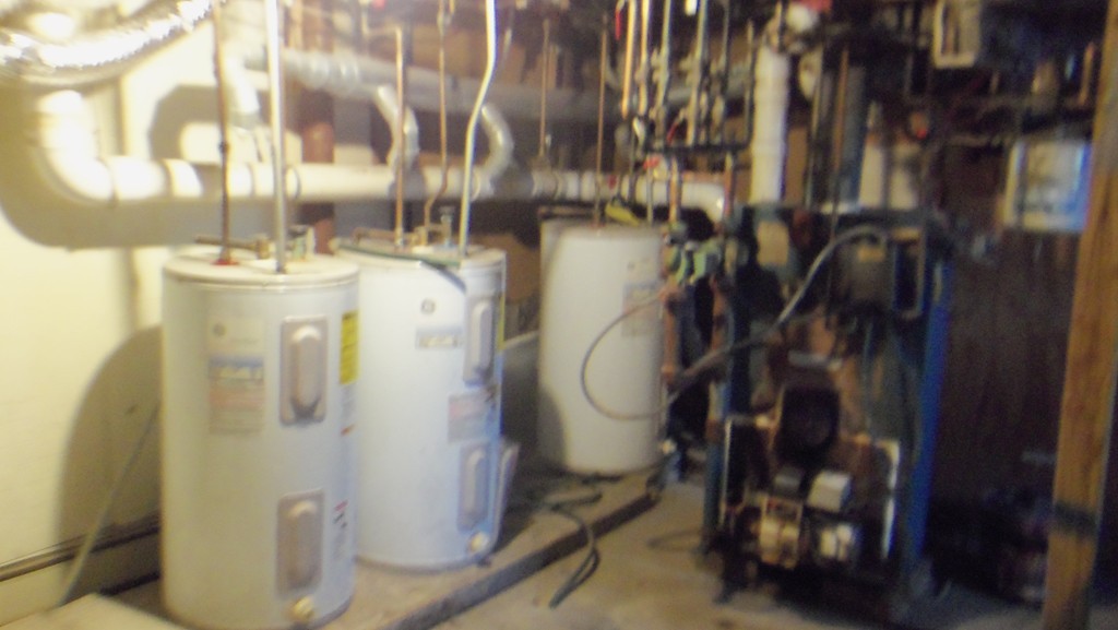 303 Rodman Street Fall River, MA 02721 - Photo 15 of 22 a close view of water heater room
