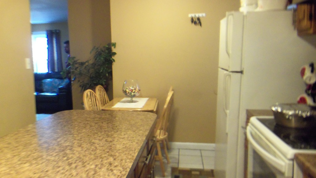 303 Rodman Street Fall River, MA 02721 - Photo 5 of 22 a bathroom with a granite countertop sink a toilet and shower