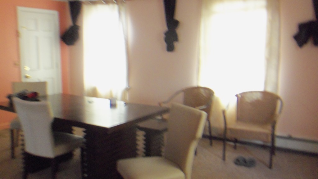303 Rodman Street Fall River, MA 02721 - Photo 10 of 22 a view of workspace and chair with wooden floor