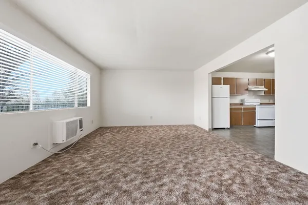 a view of an empty room and window