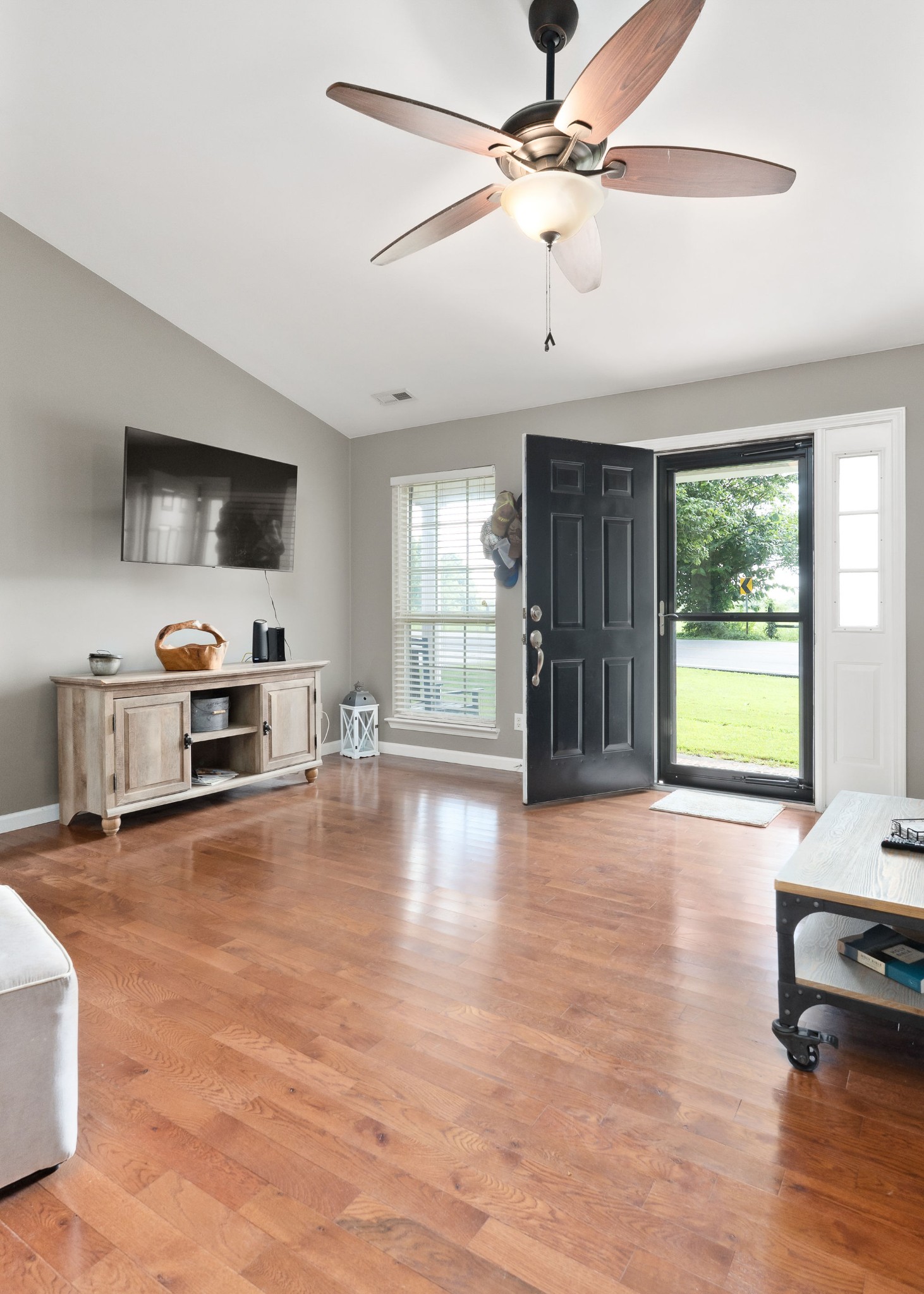 143 Old Qualls Road Cookeville, TN 38506 - Photo 14 of 40 a living room with furniture and a flat screen tv