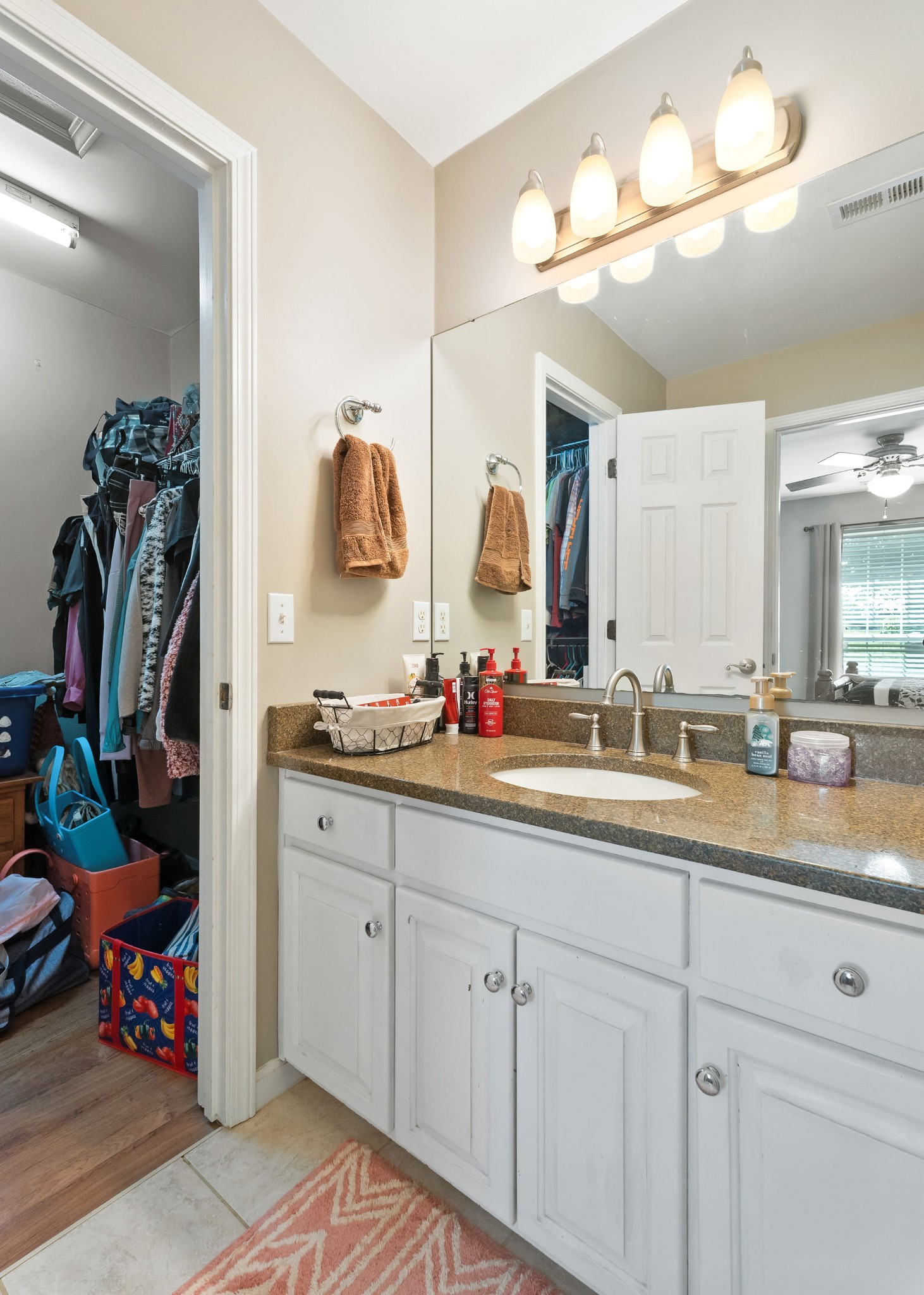 143 Old Qualls Road Cookeville, TN 38506 - Photo 30 of 40 a bathroom with a sink double vanity and mirror