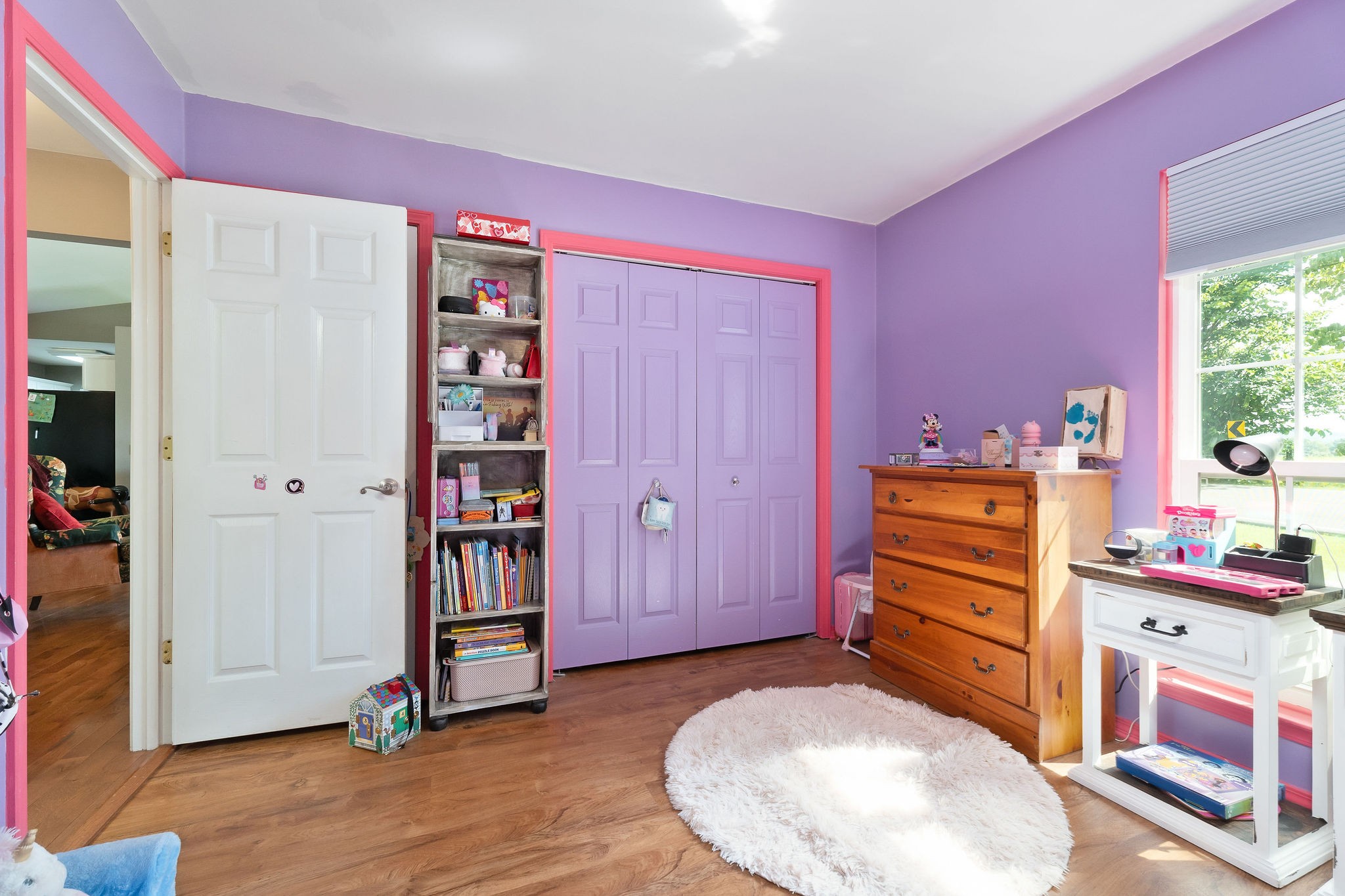 143 Old Qualls Road Cookeville, TN 38506 - Photo 36 of 40 a room with toys and dresser with wooden floor