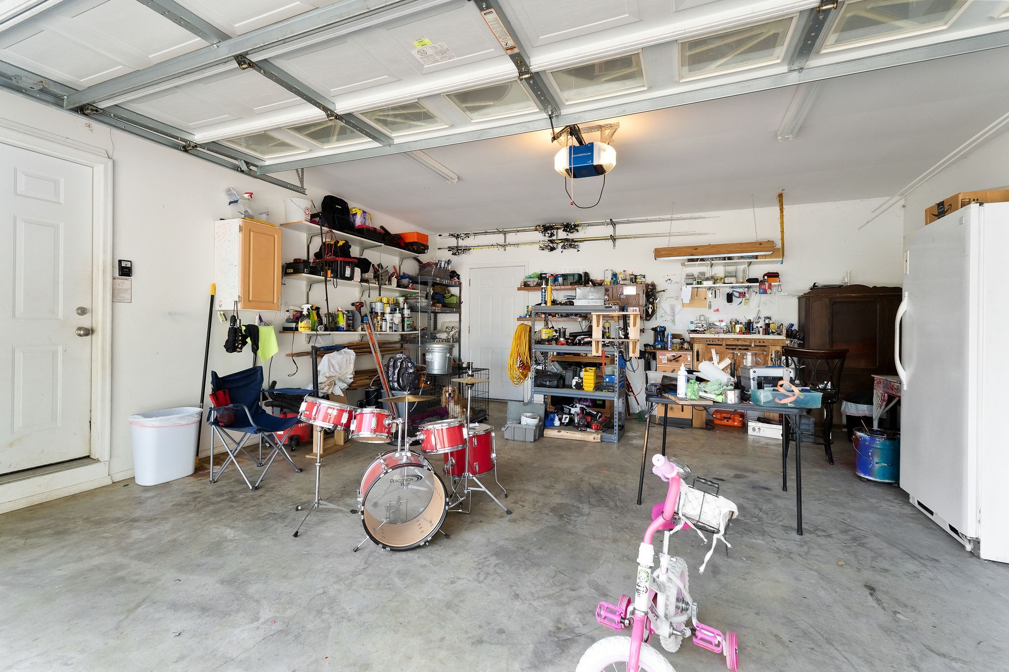 143 Old Qualls Road Cookeville, TN 38506 - Photo 38 of 40 a view of a storage room with a lot of stuff