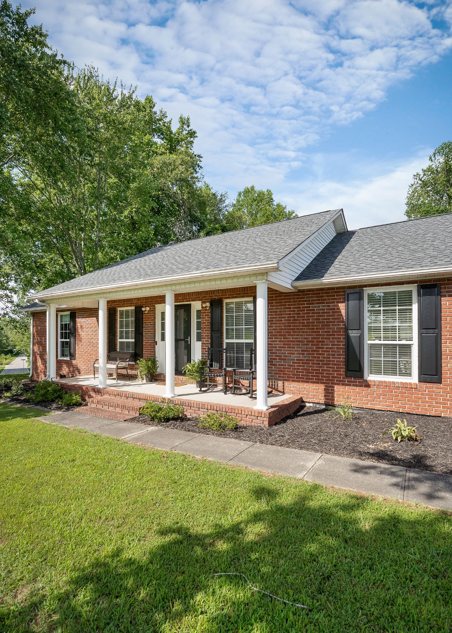 143 Old Qualls Road Cookeville, TN 38506 - Photo 4 of 40 a front view of house with yard and green space