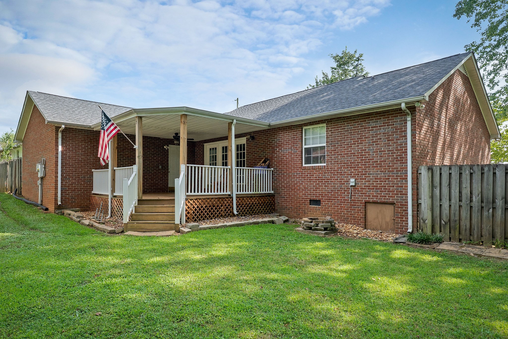 143 Old Qualls Road Cookeville, TN 38506 - Photo 5 of 40 a front view of a house with garden