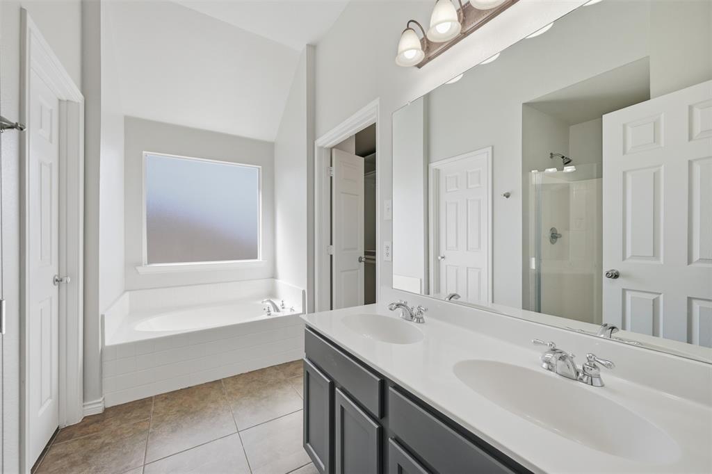 5408 Bridgeport Road McKinney, TX 75071 - Photo 11 of 22 a bathroom with a sink and a mirror