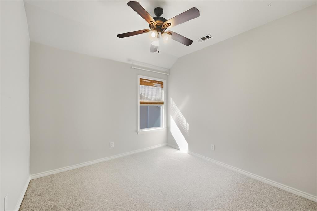 5408 Bridgeport Road McKinney, TX 75071 - Photo 14 of 22 an empty room with a window and a fan