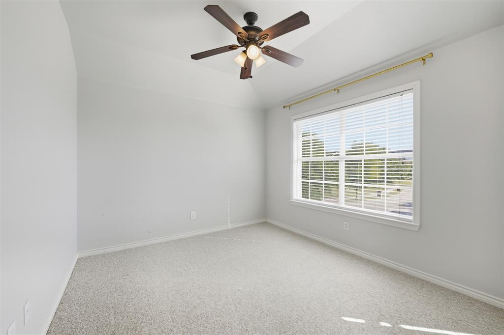 5408 Bridgeport Road McKinney, TX 75071 - Photo 16 of 22 a view of a livingroom with a ceiling fan and window