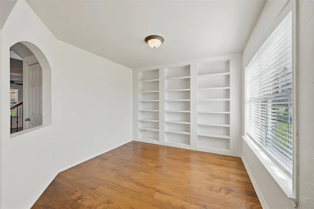 a view of a room with shelf and empty racks