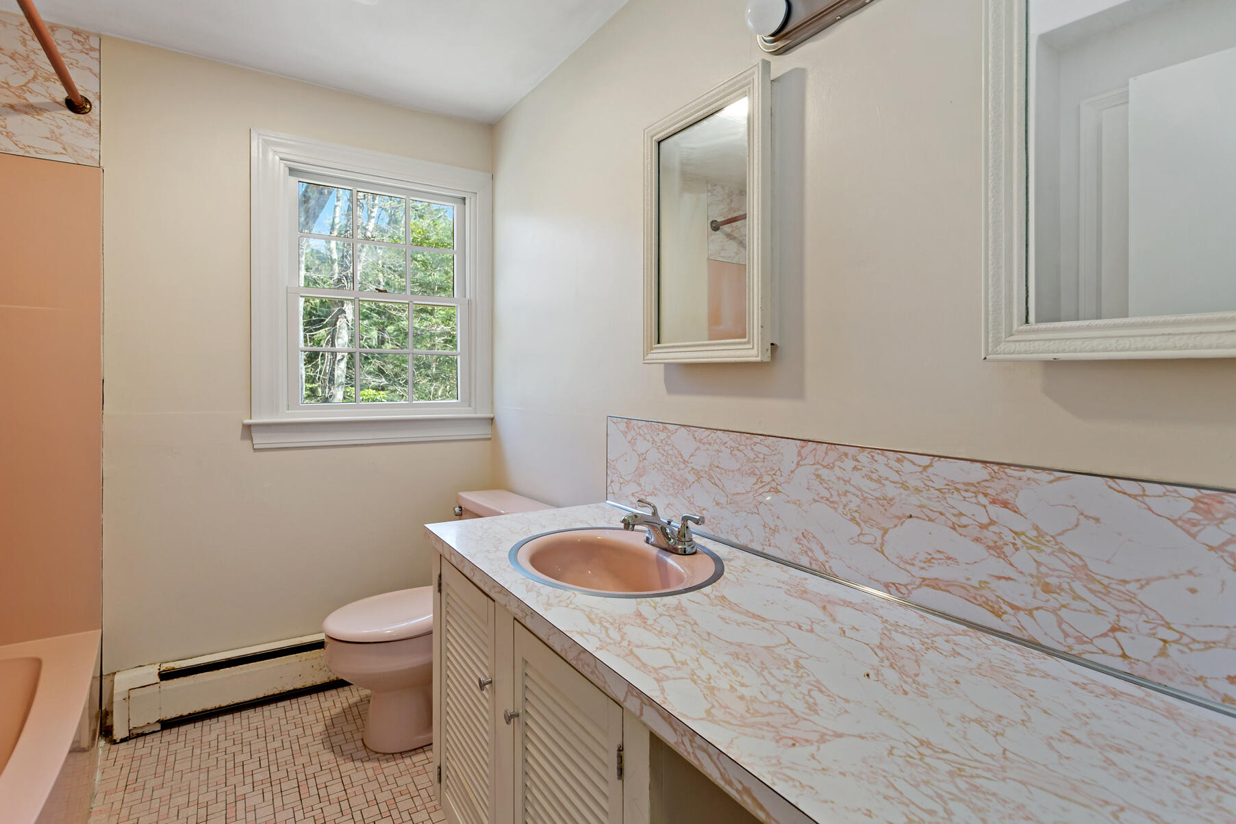 1092 Osterville West Barnstable Road Barnstable, MA 02648 - Photo 14 of 25 a bathroom with a granite countertop sink and a toilet