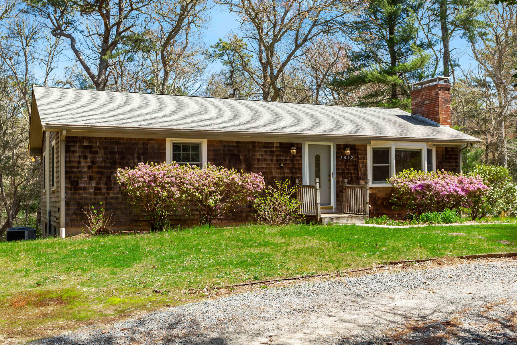 1092 Osterville West Barnstable Road Barnstable, MA 02648 - Photo 19 of 25 a view of a house with garden and yard
