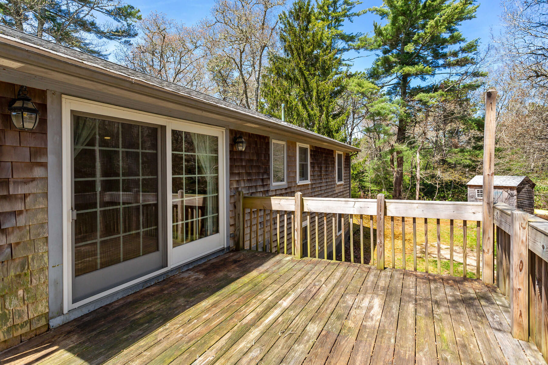 1092 Osterville West Barnstable Road Barnstable, MA 02648 - Photo 21 of 25 a view of a house with a large window