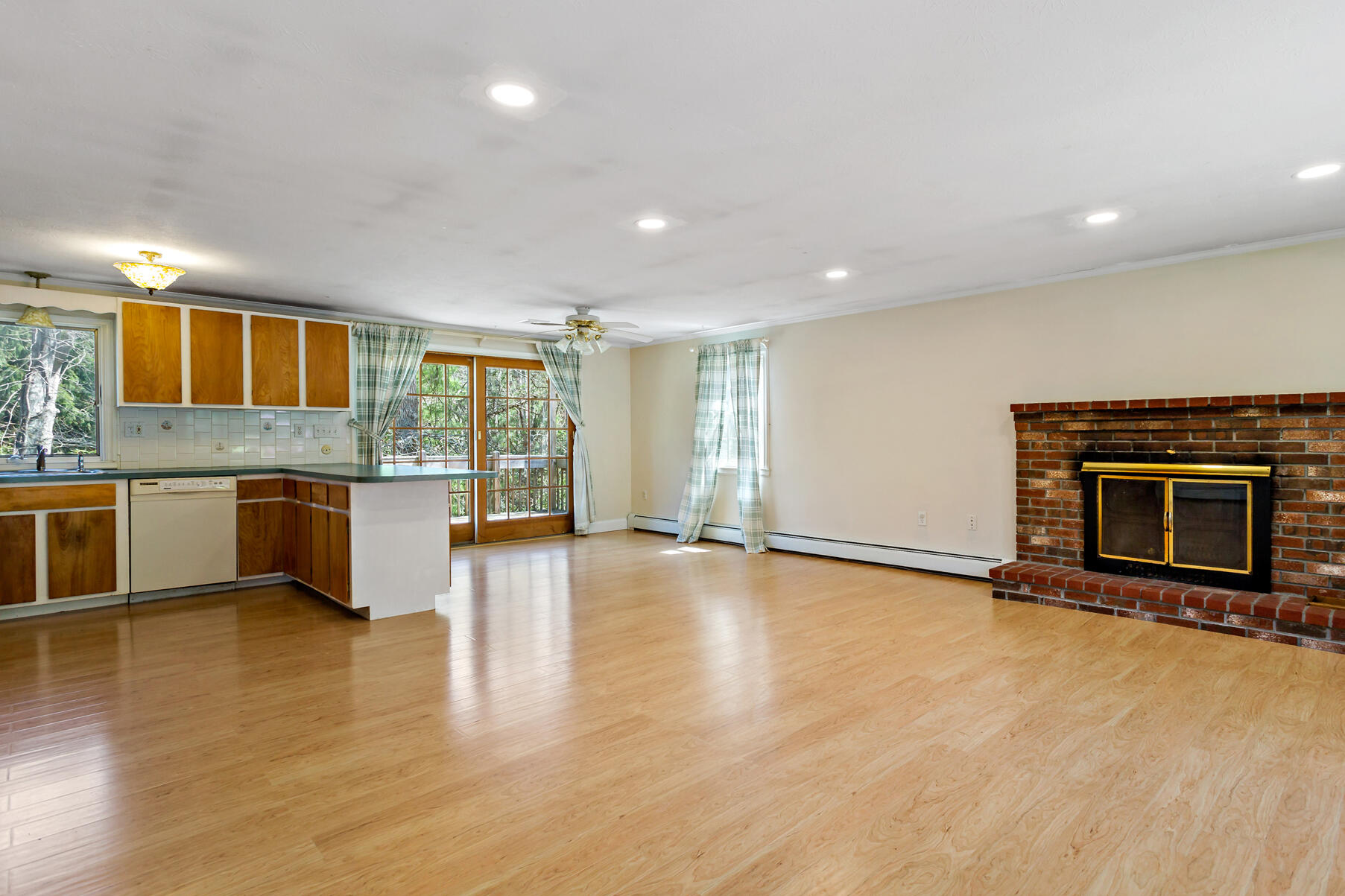 1092 Osterville West Barnstable Road Barnstable, MA 02648 - Photo 5 of 25 a view of a kitchen with a sink and a large window