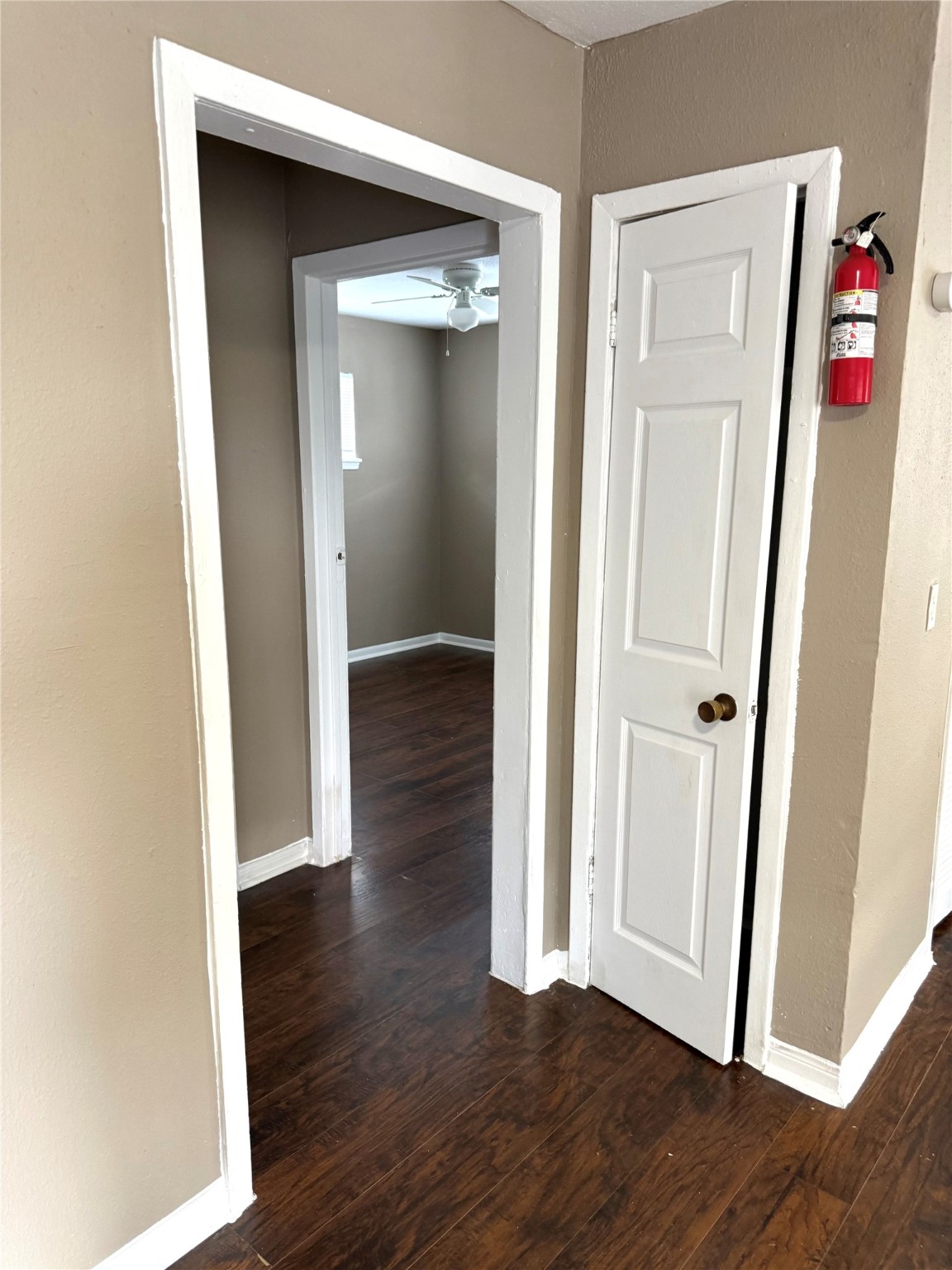 5412 Market Street, Unit 3 Houston, TX 77020 - Photo 5 of 11 an empty room with wooden floor and closet