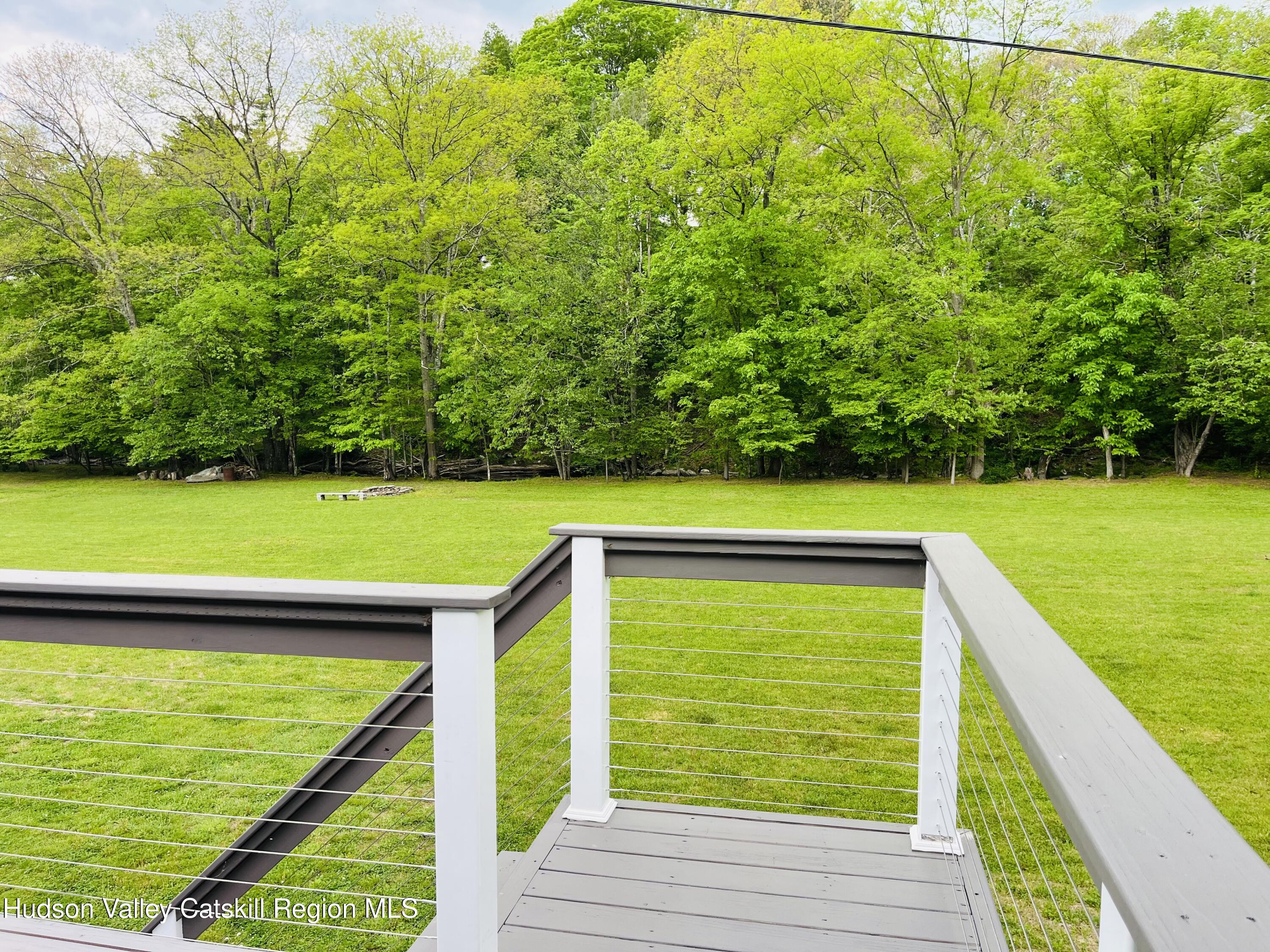 685 Sandy Plains Road Athens, NY 12451 - Photo 11 of 37 a view of a swimming pool with a patio