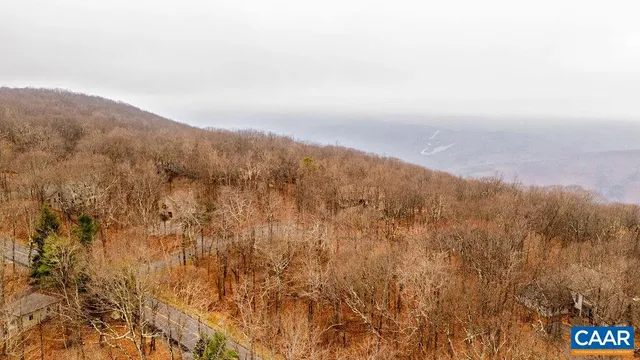 a view of mountains and valleys