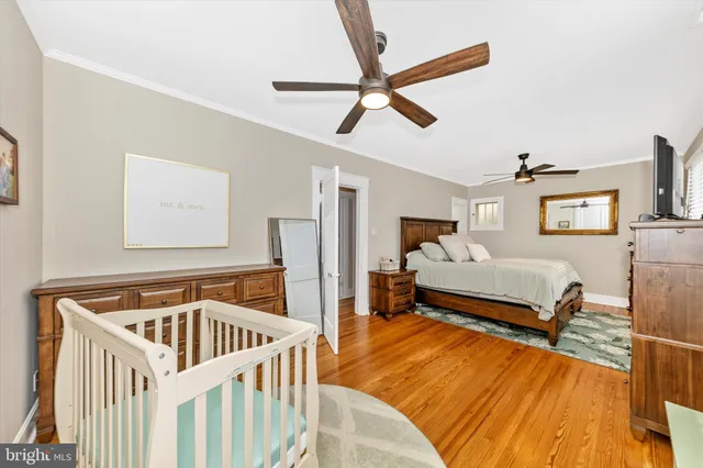 a bedroom with furniture and window