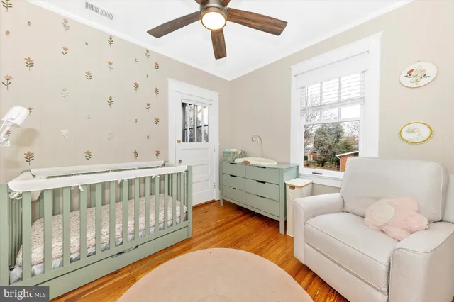 a living room with furniture and windows