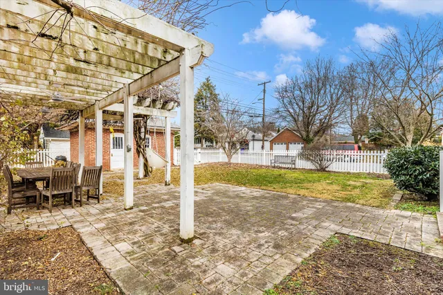 a building with trees in the background