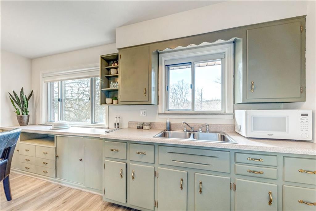 101 Lorish Road, Unit A McKees Rocks, PA 15136 - Photo 11 of 25 a white kitchen with sink and cabinets